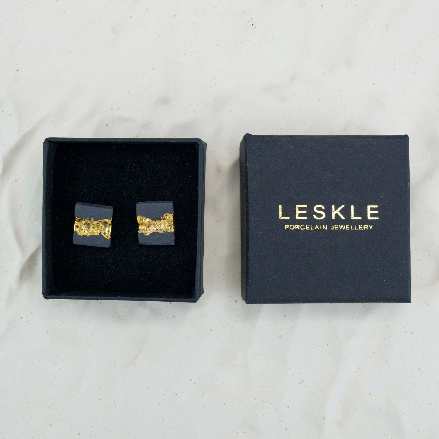 "GOLDEN ECLIPSE" PORCELAIN STUD EARRINGS