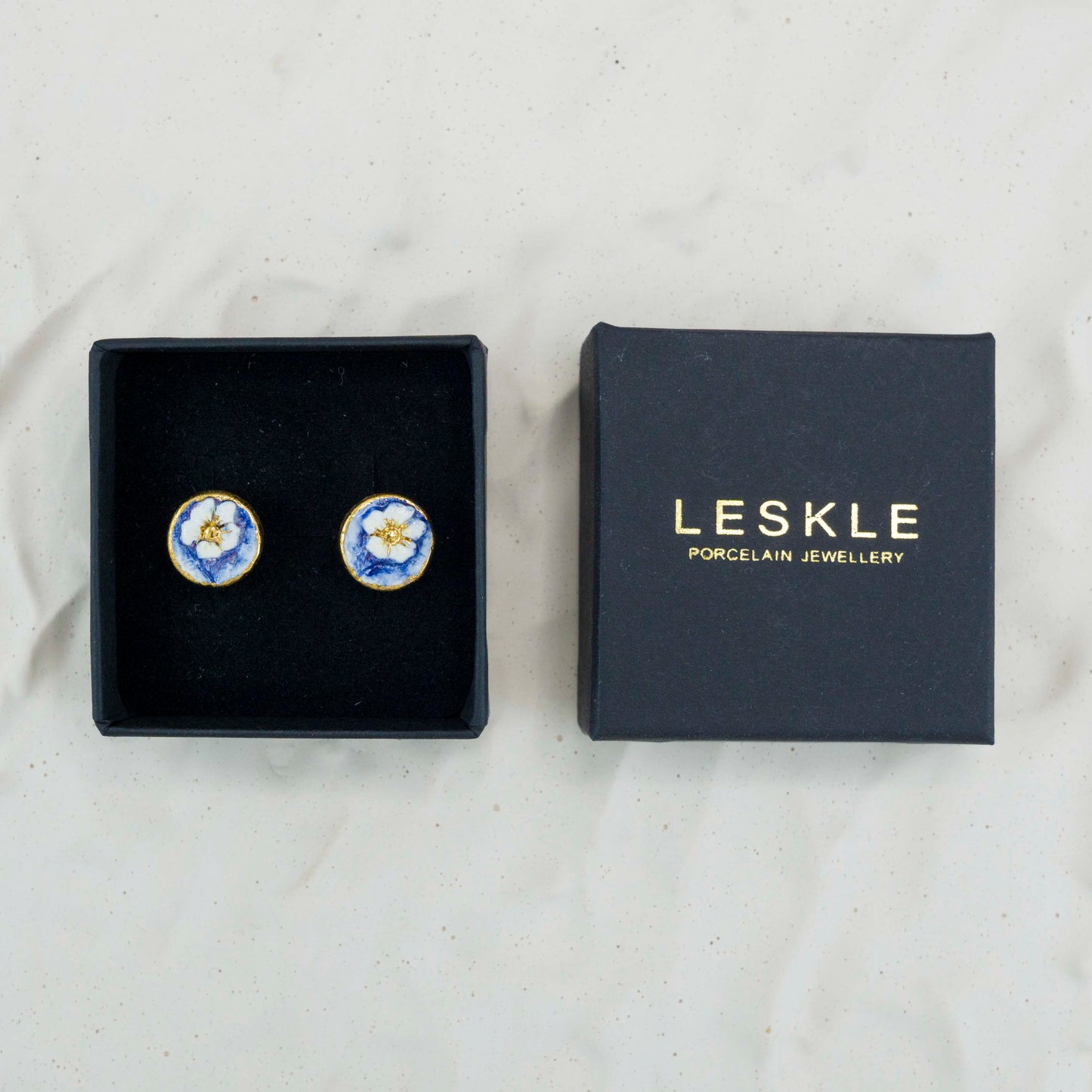 "WHITE BLOOM IN BLUE" PORCELAIN STUD EARRINGS