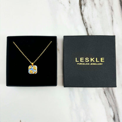 "FLORAL GLINT" PORCELAIN NECKLACE